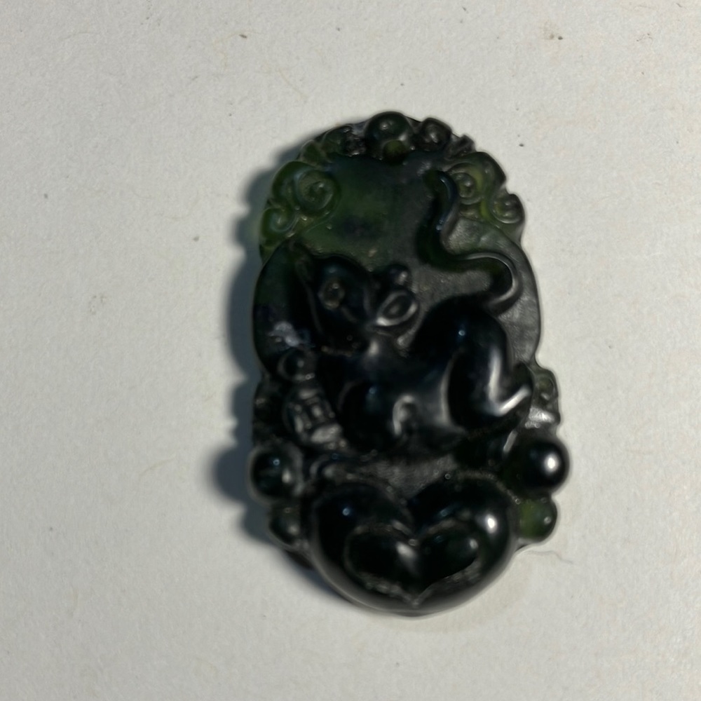 Dark green Burma jade pendant